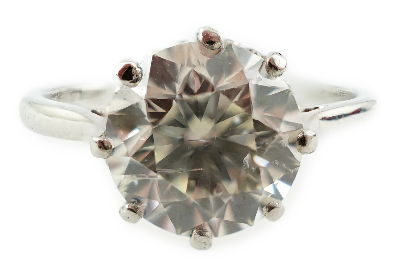 A platinum and solitaire diamond set ring